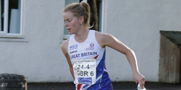 Eilidh running through a town