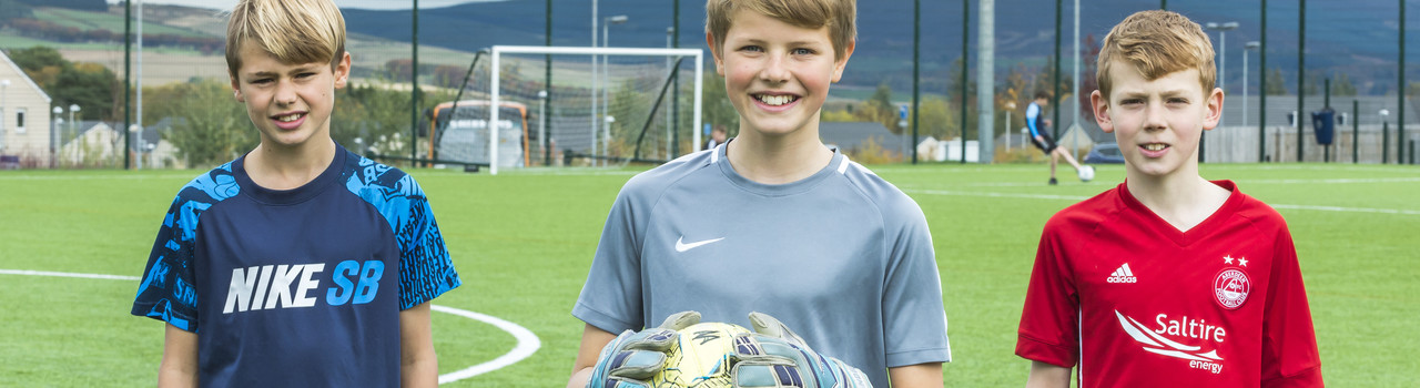 Boys playing football