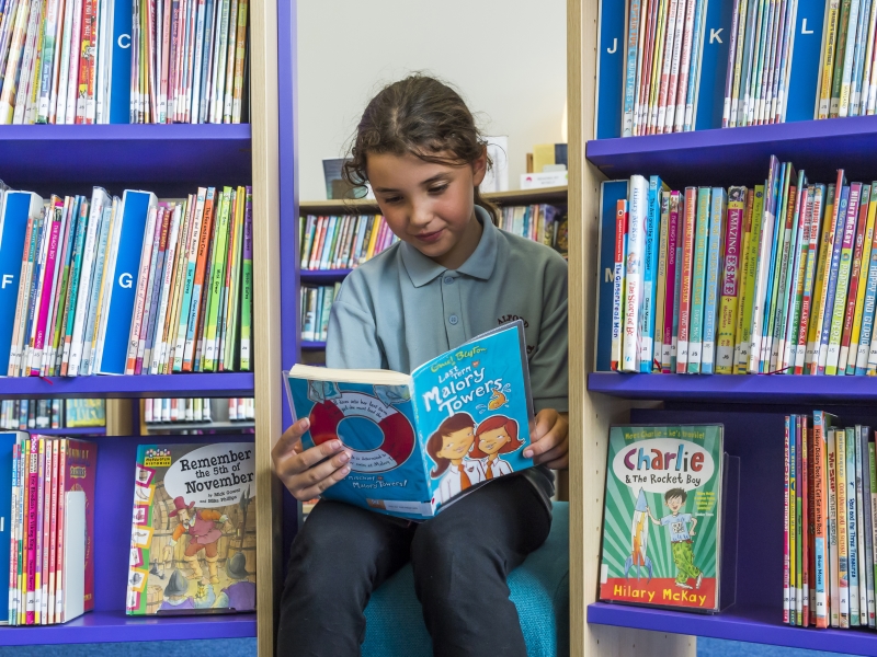 child reading book