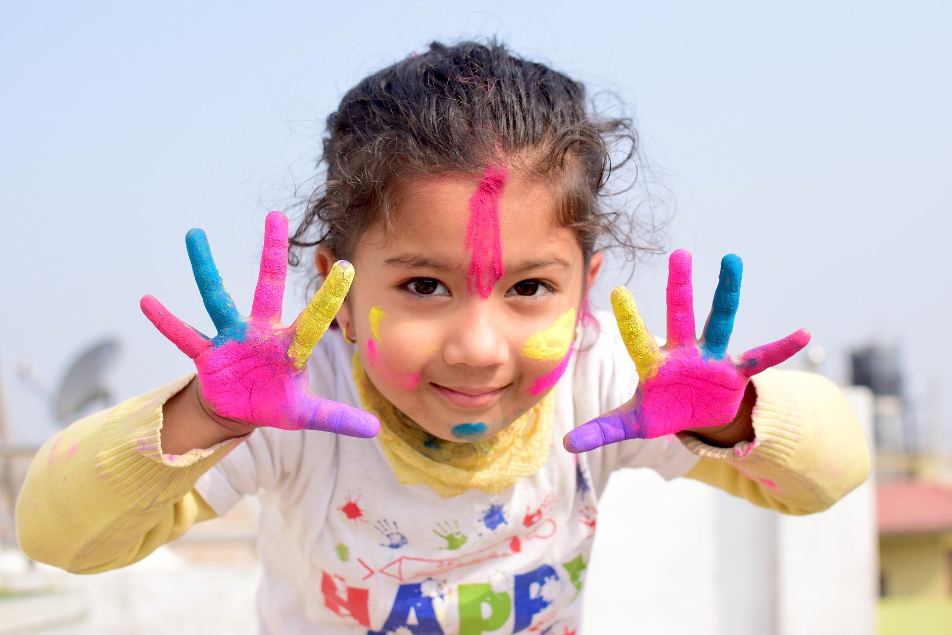 girl with paint on her hands