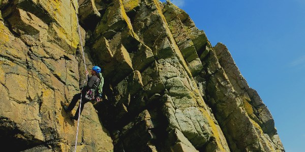 A person abseiling