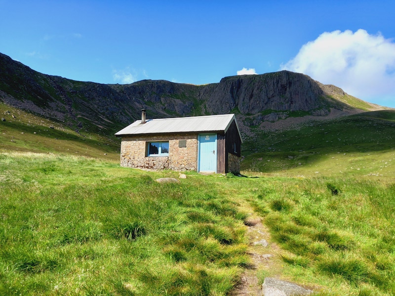 path leading to Bothy with mountain in the background
