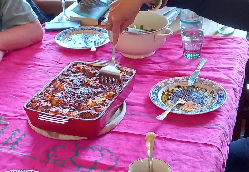 Food being served on top of pink cloth