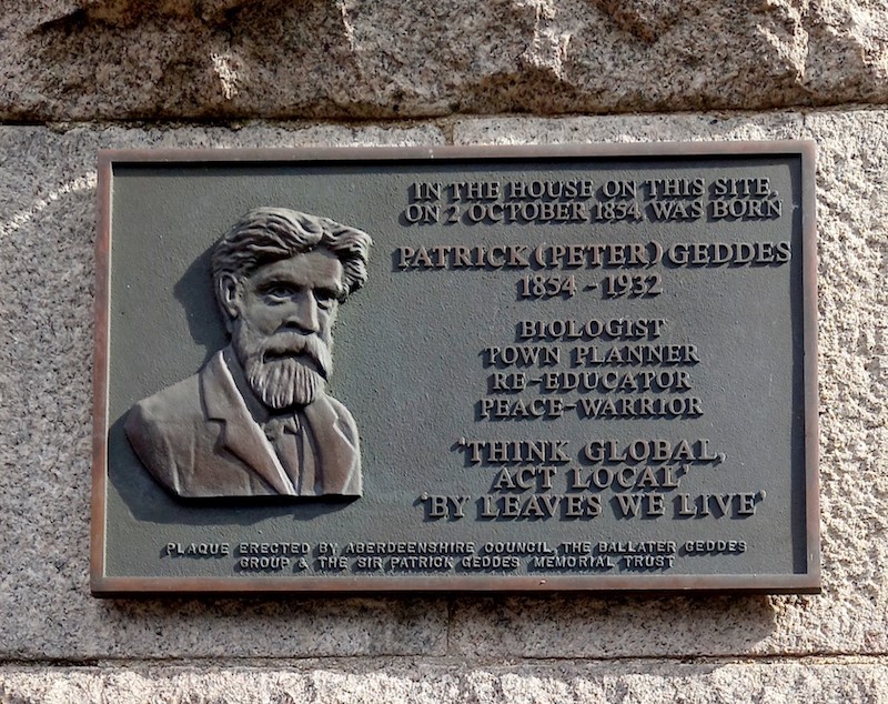 Patrick Geddes Memorial plaque on the wall - Think Global, Act Local, By leaves we live