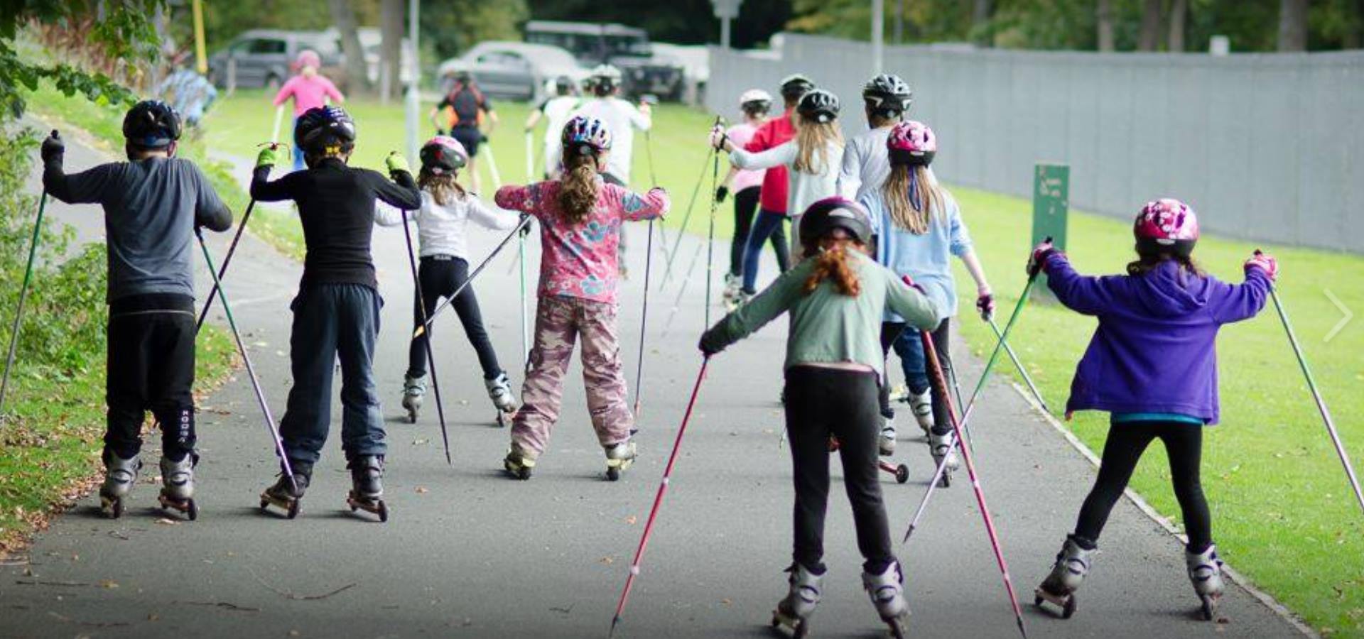 A group of children enjoying a nordic ski lesson