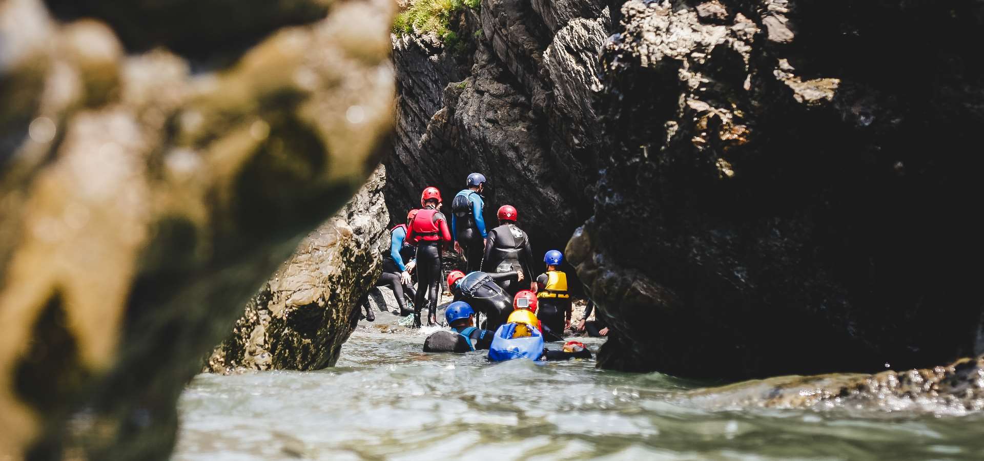 A group of people gorge walking