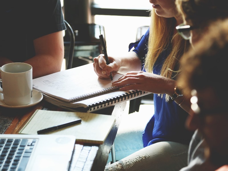 A group of people at a business meeting