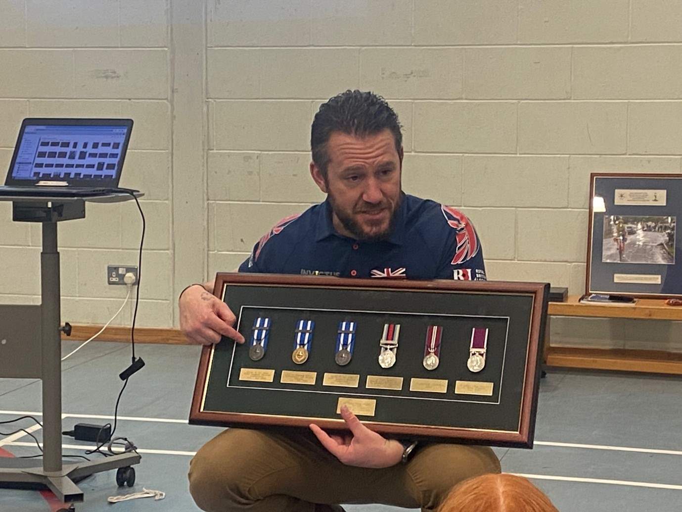 David Jarvis shows off his medals