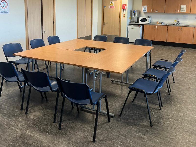 Macduff Community Area 1 with tables and chairs